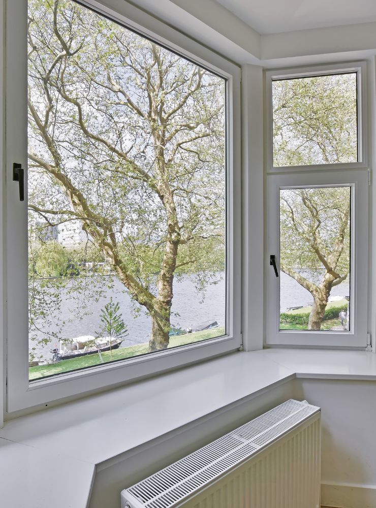 case tall windows - professional window trim installation showing finished casing on tall windows