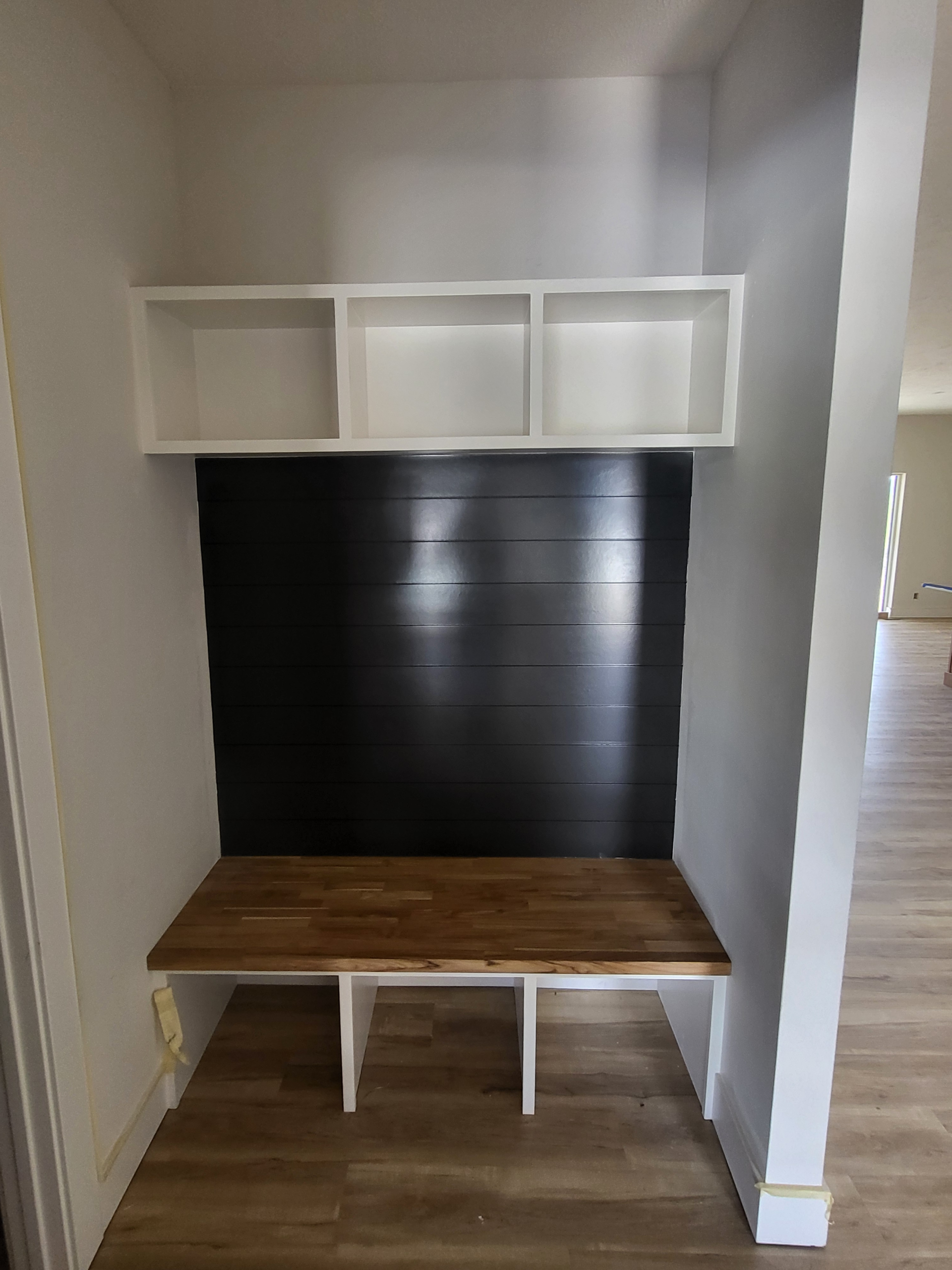 install shiplap — custom entryway with full-height shiplap wall showing consistent board spacing