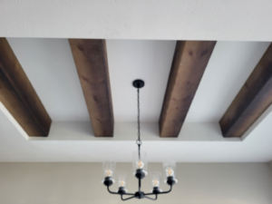 Elegant Ceiling Beams and Chandelier
