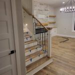 Garage step handrail