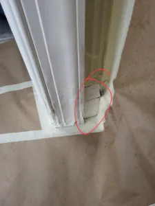 Incorrect: door jamb extension with a visible gap and poor fit where it meets the base