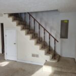 Garage step handrail