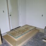 Garage step handrail