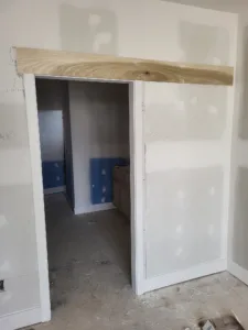 Barn-door opening: wood jamb preparation is shared; the barn-door hardware is outside this lesson.