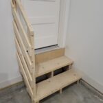 Garage step handrail