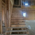 Garage step handrail