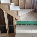 Garage step handrail