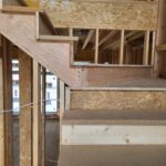 Garage step handrail