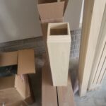This photo shows a partially assembled skirt board, indicating work in progress for trim installation.