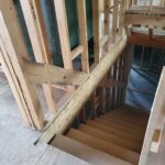 Garage step handrail