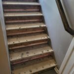 Garage step handrail