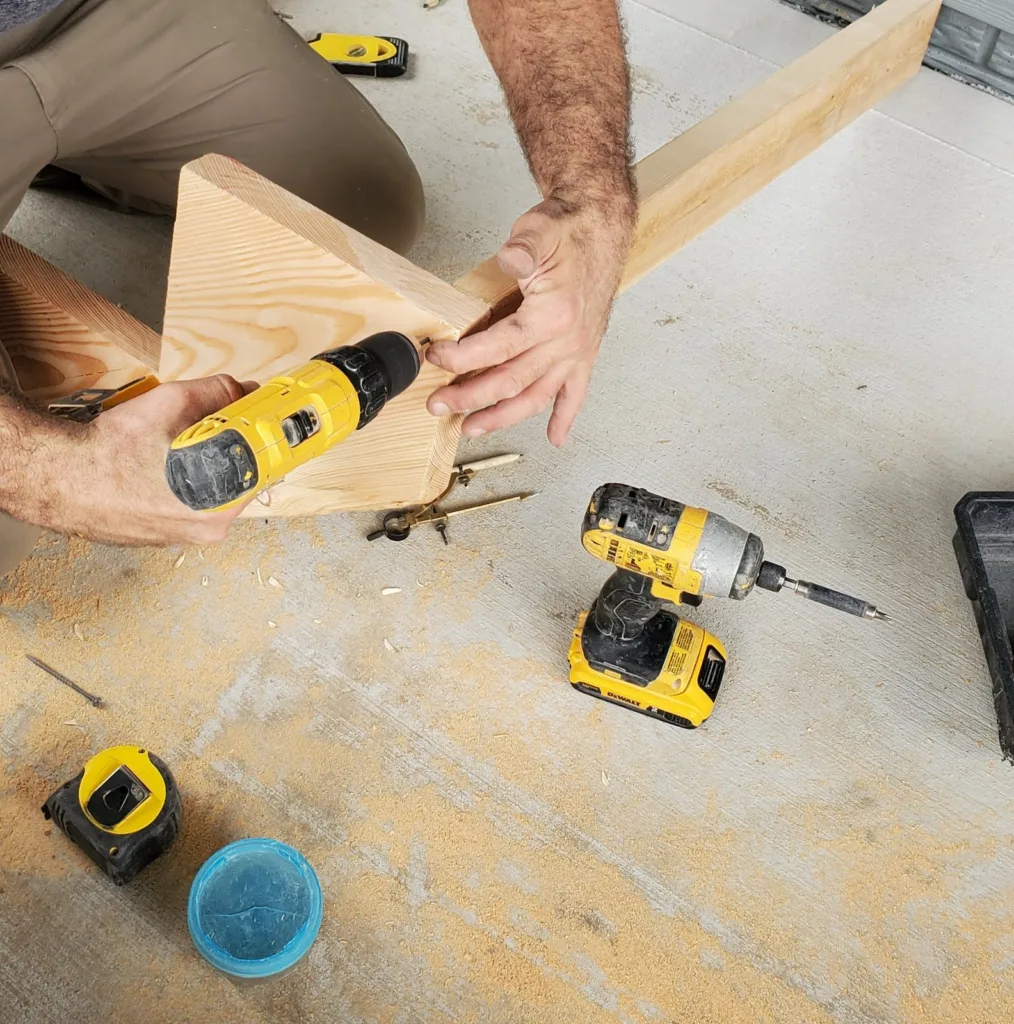 Screwing through the side of a stringer into the end of the back board that joins the two stringers